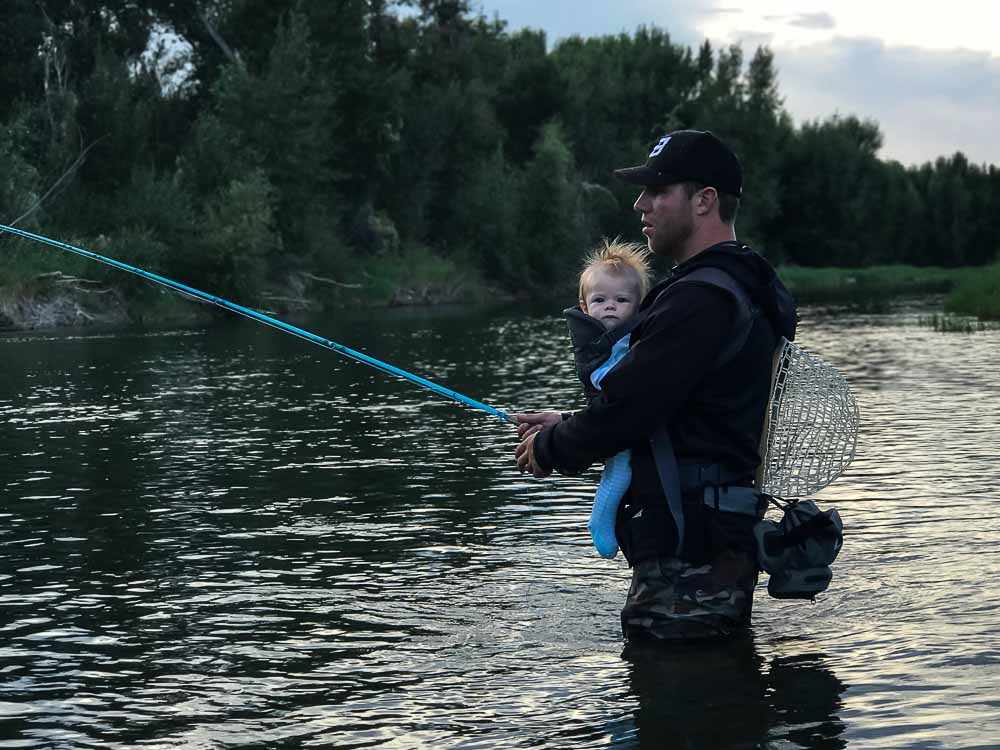 catching fish with baby reel Fly Fishing with a Baby in Tow – Frosty Fly