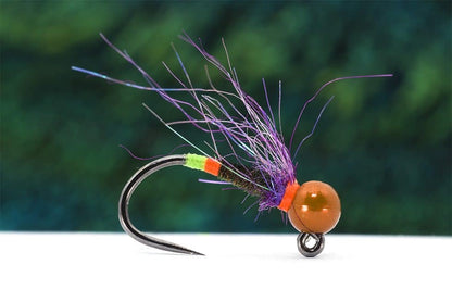 Purple Winged Coffee Nymph tied with Peacock Herl