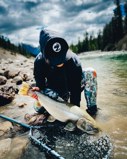 SolarFlexz™ UVPro Camo Lightweight Compression Polyester Fishing Pants - Mens - Sandstorm Camo - in action